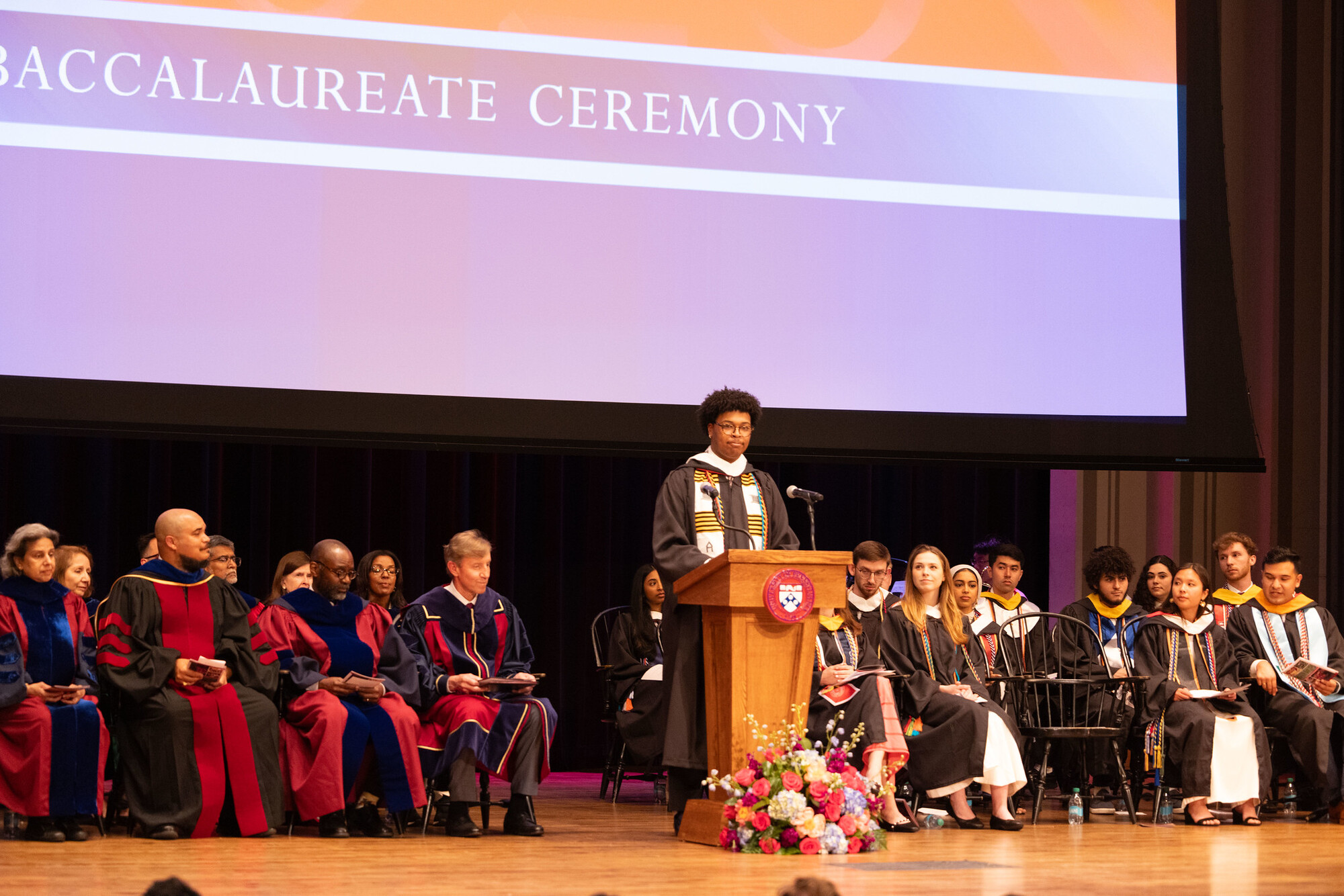 A student speaking at the podium at Penn’s Baccalaureate ceremony.