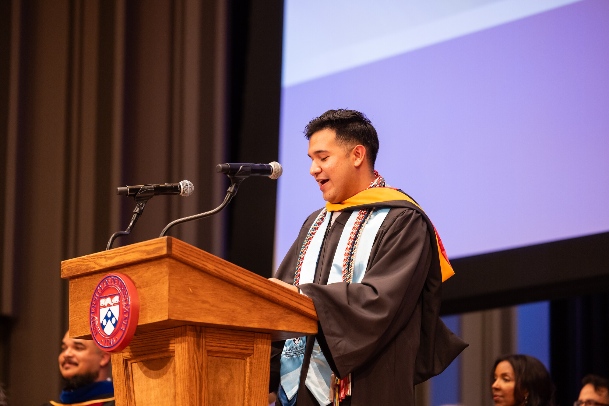 A student at the podium during Penn’s Baccalaureate celebrartion.