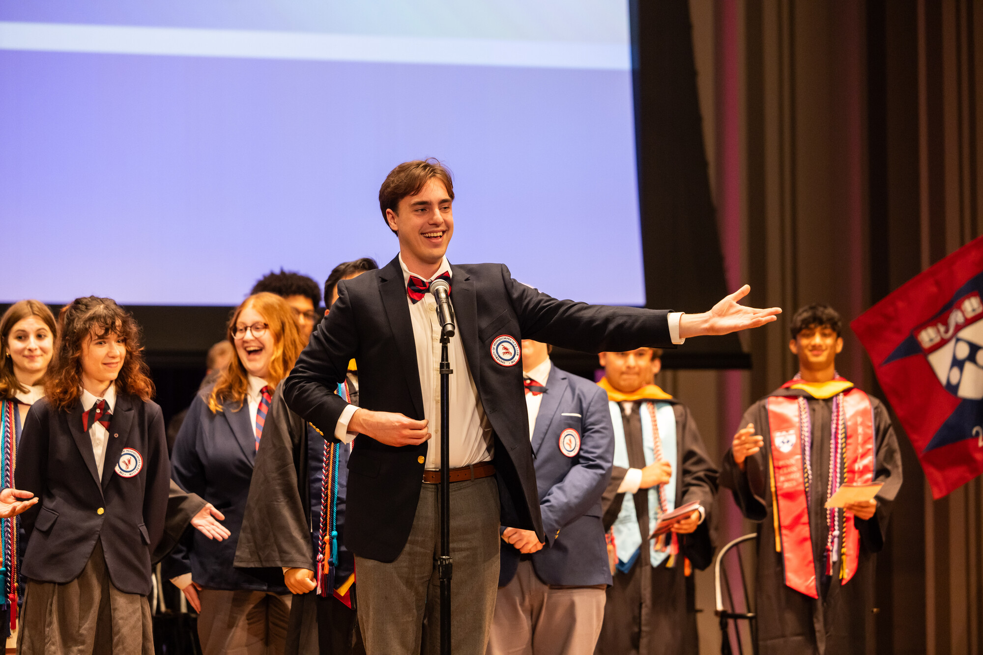 Penn’s Glee Club performing on stage at Penn’s Baccalaureate celebration.