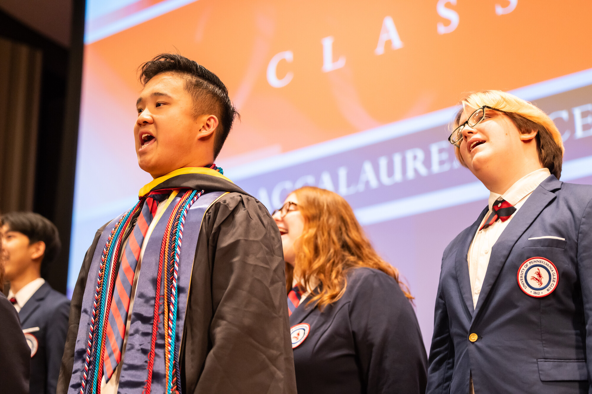 Penn’s Glee Club performing on stage at Penn’s Baccalaureate celebration.