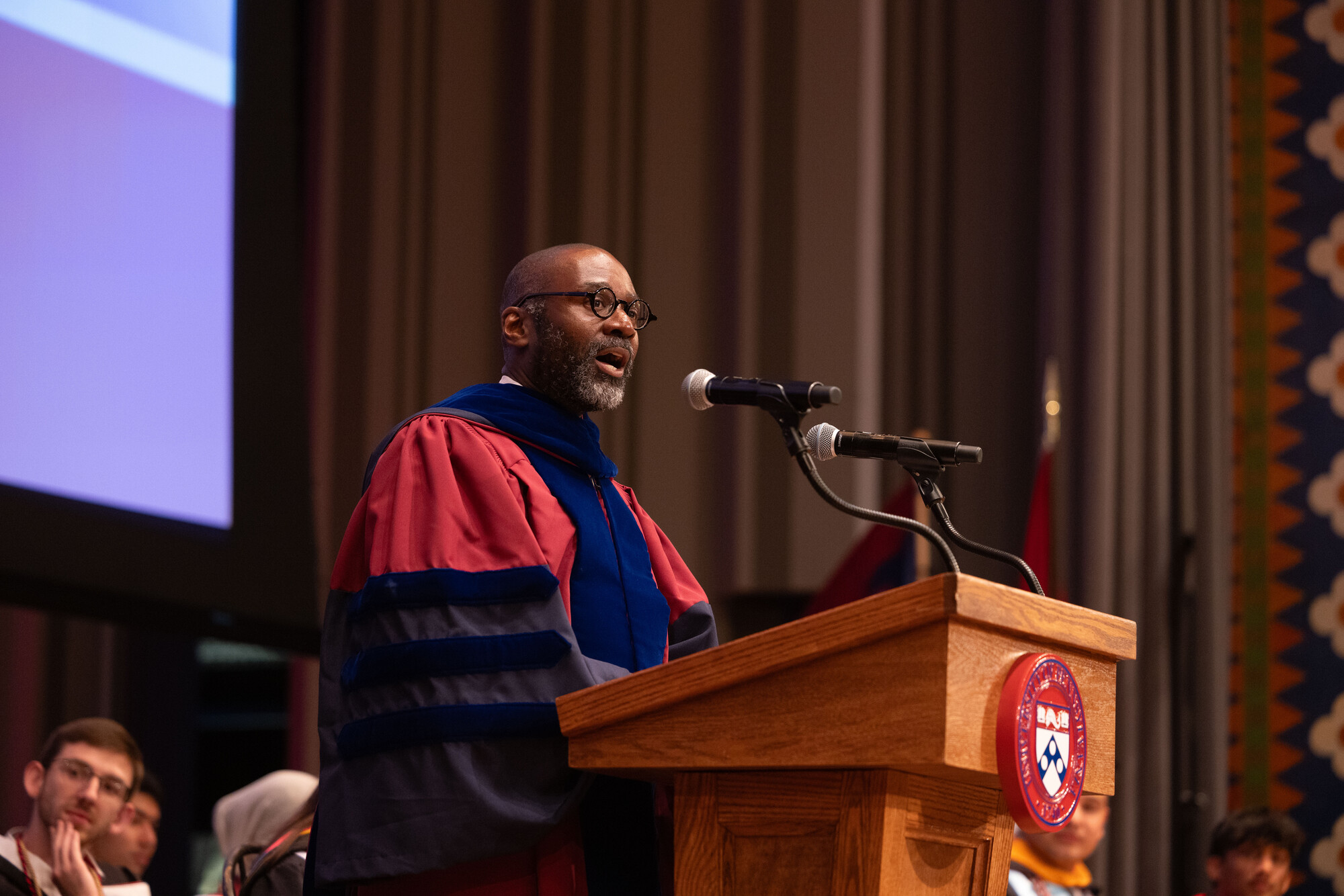 Penn Provost John L. Jackson Jr. at the podium during Penn’s Baccalaureate celebration.
