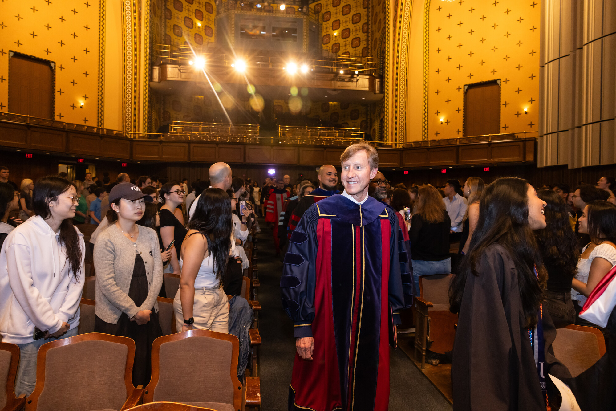 Penn President J. Larry Jameson walking down the aisle at the Baccalaureate celebration.