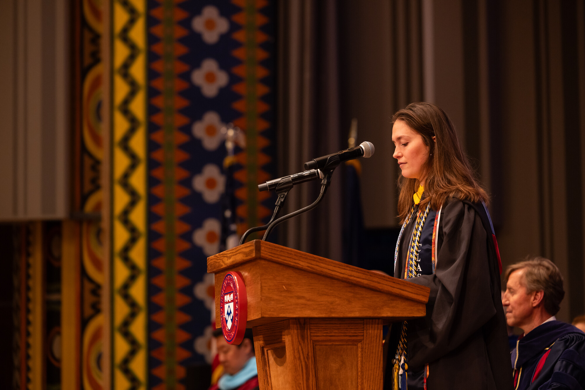 A student at the podium for Penn’s Baccalaureate ceremony.