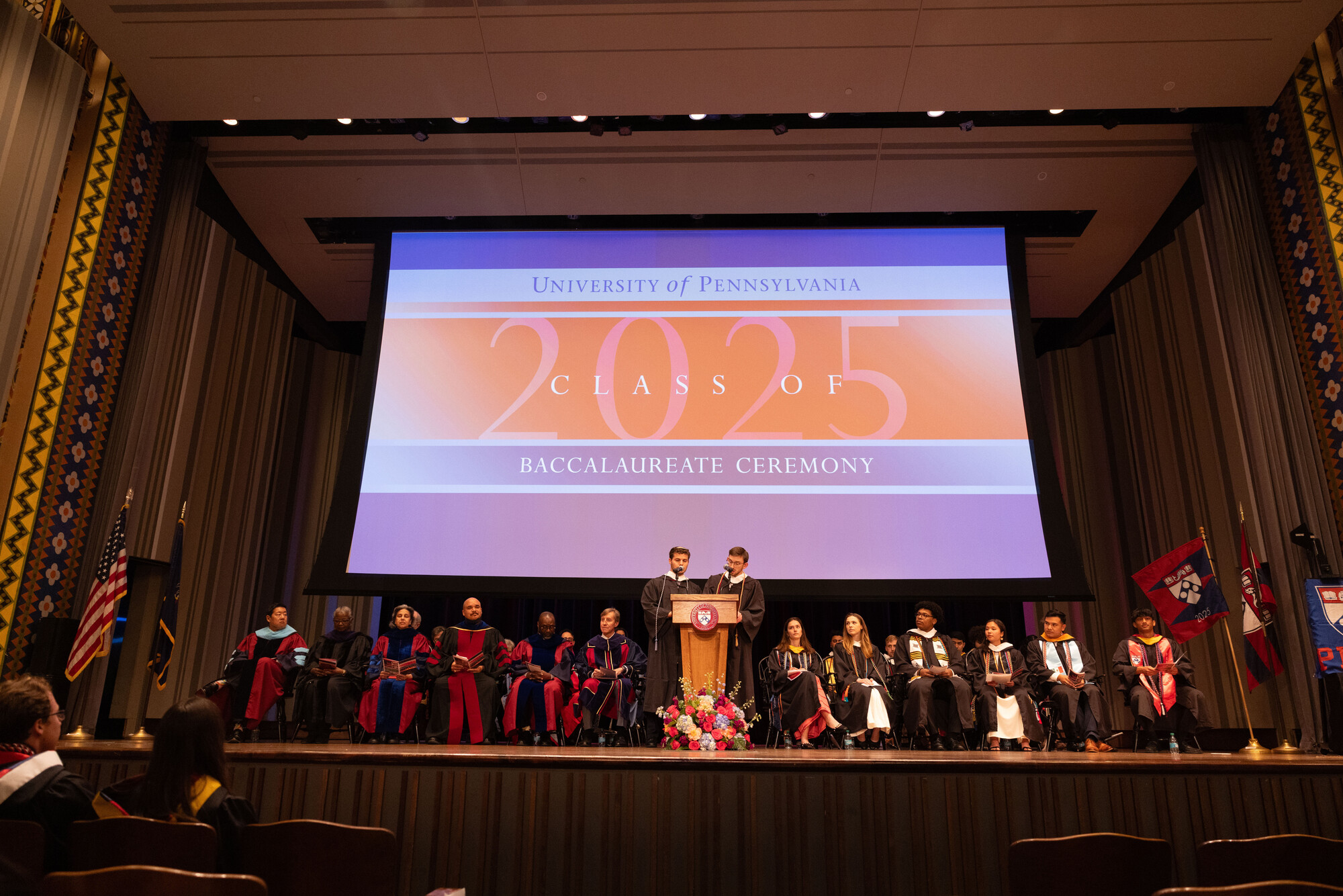 Students at the podium during Penn’s Baccalaureate celebration.