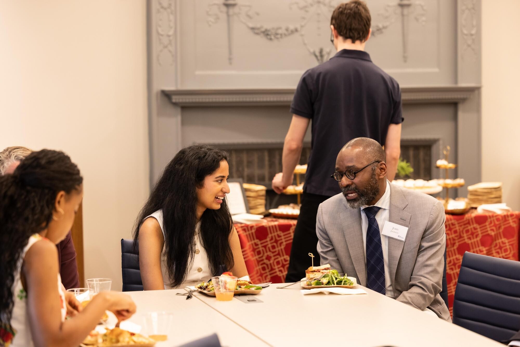 Provost Jackson speaks with Rashmi Acharaya at the PIP/PEP luncheon.