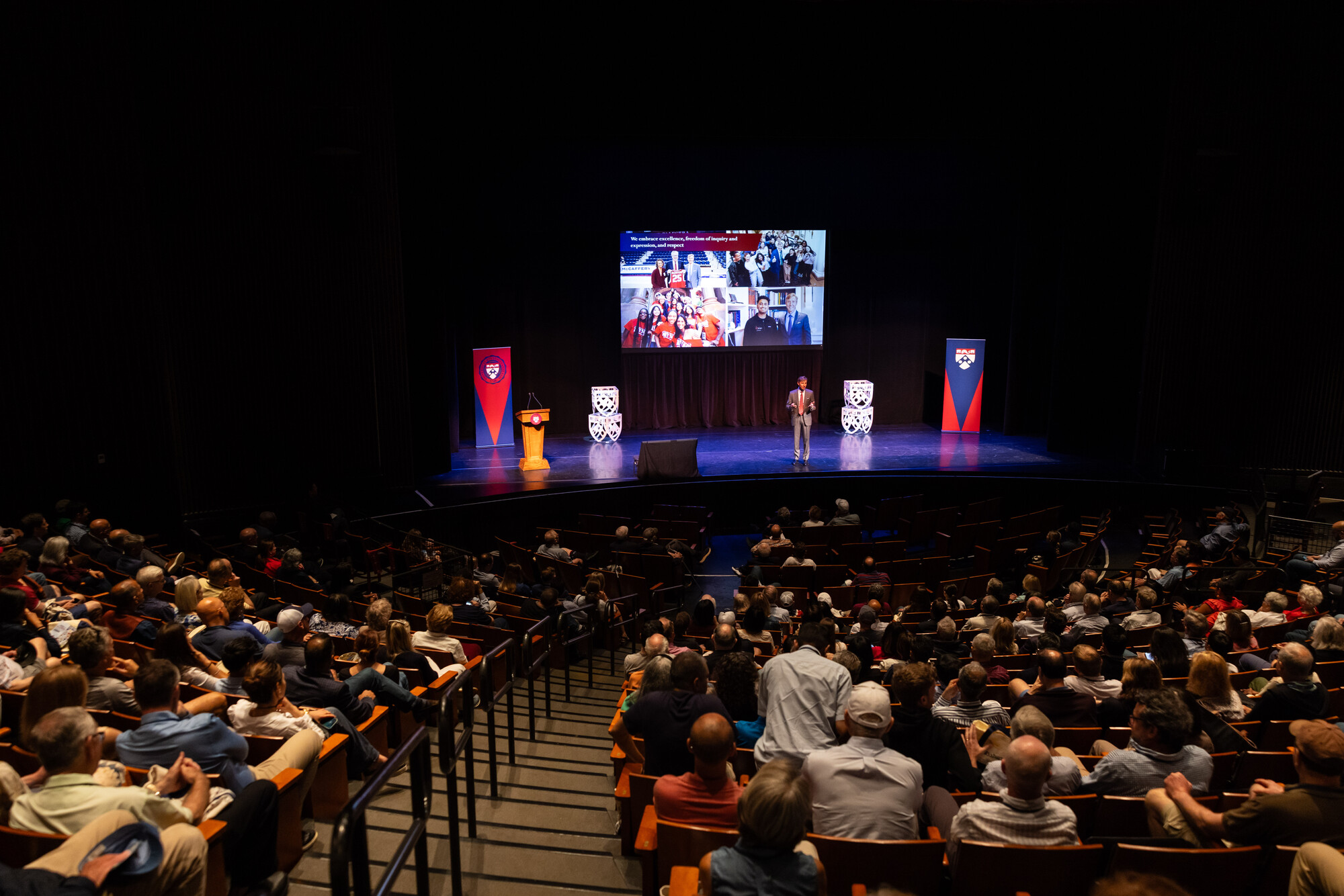 J. Larry Jameson speaking on stage.