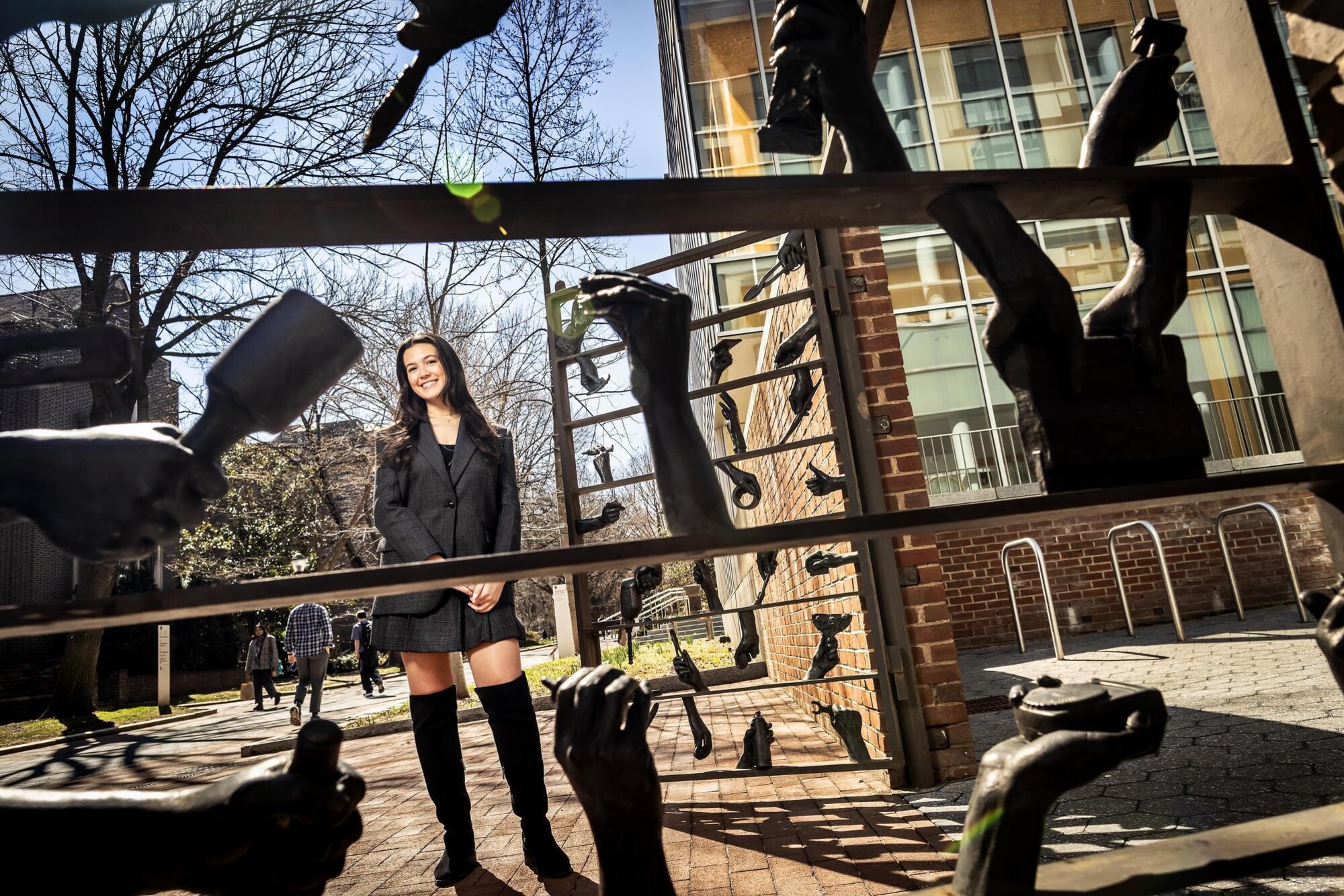 Thea Kerekes in front of Charles Addams Fine Arts Hall.