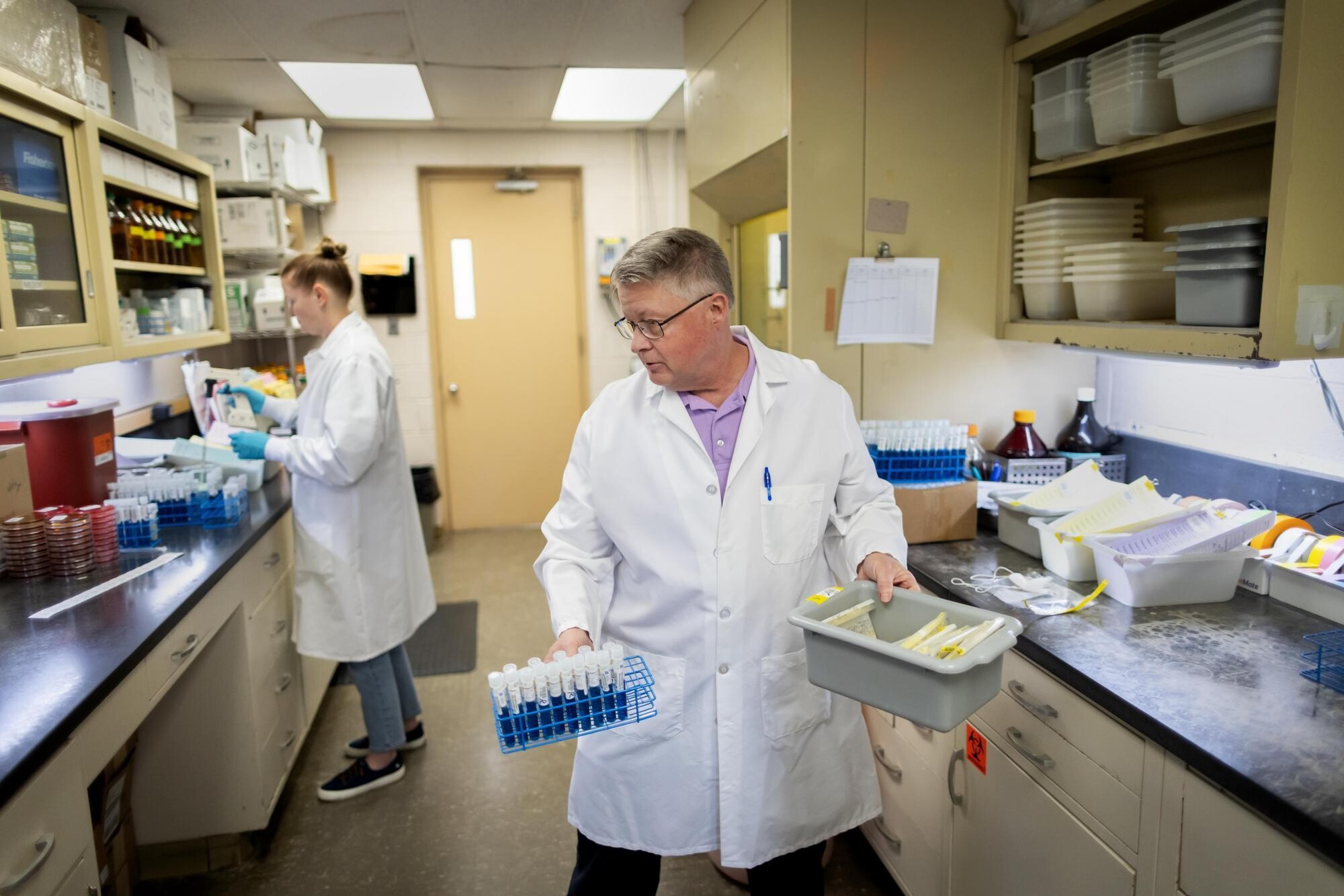 Two researchers working in a lab.