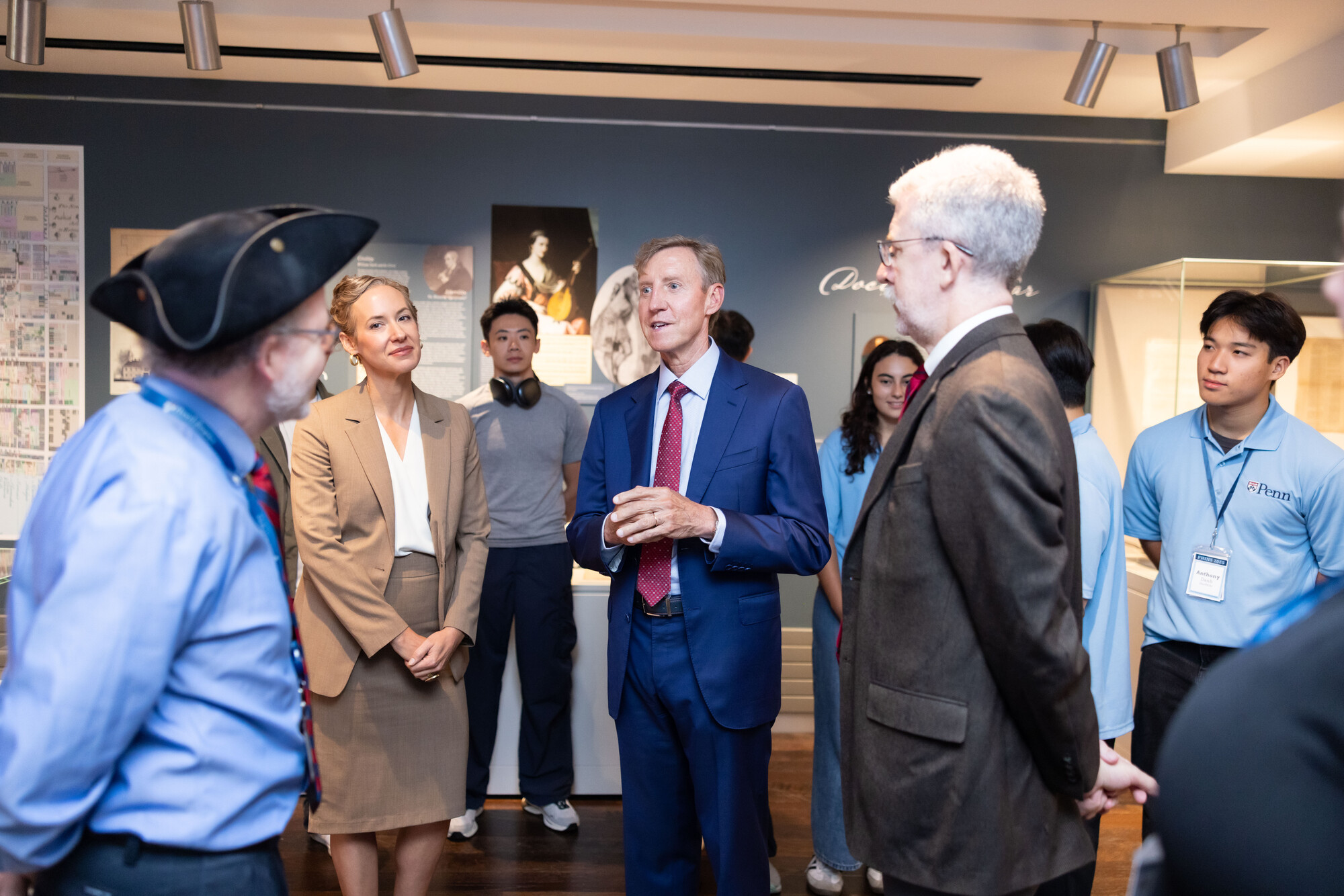 Penn President J. Larry Jameson, Penn Libraries director Brigitte Weinsteiger and others at the Revolution at Penn? Libraries exhibit.