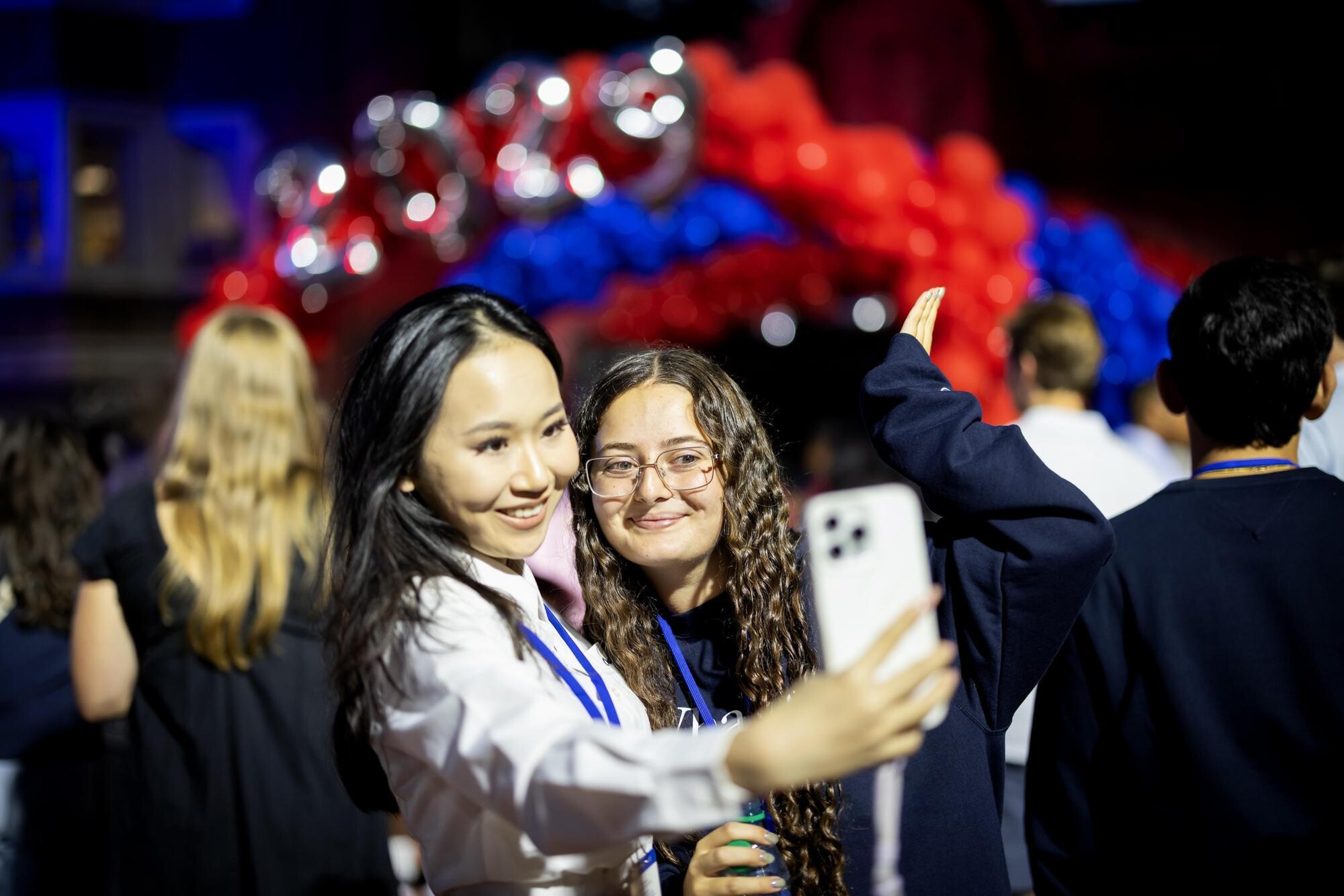 Students pose for a selfie during Penn’s convocation.