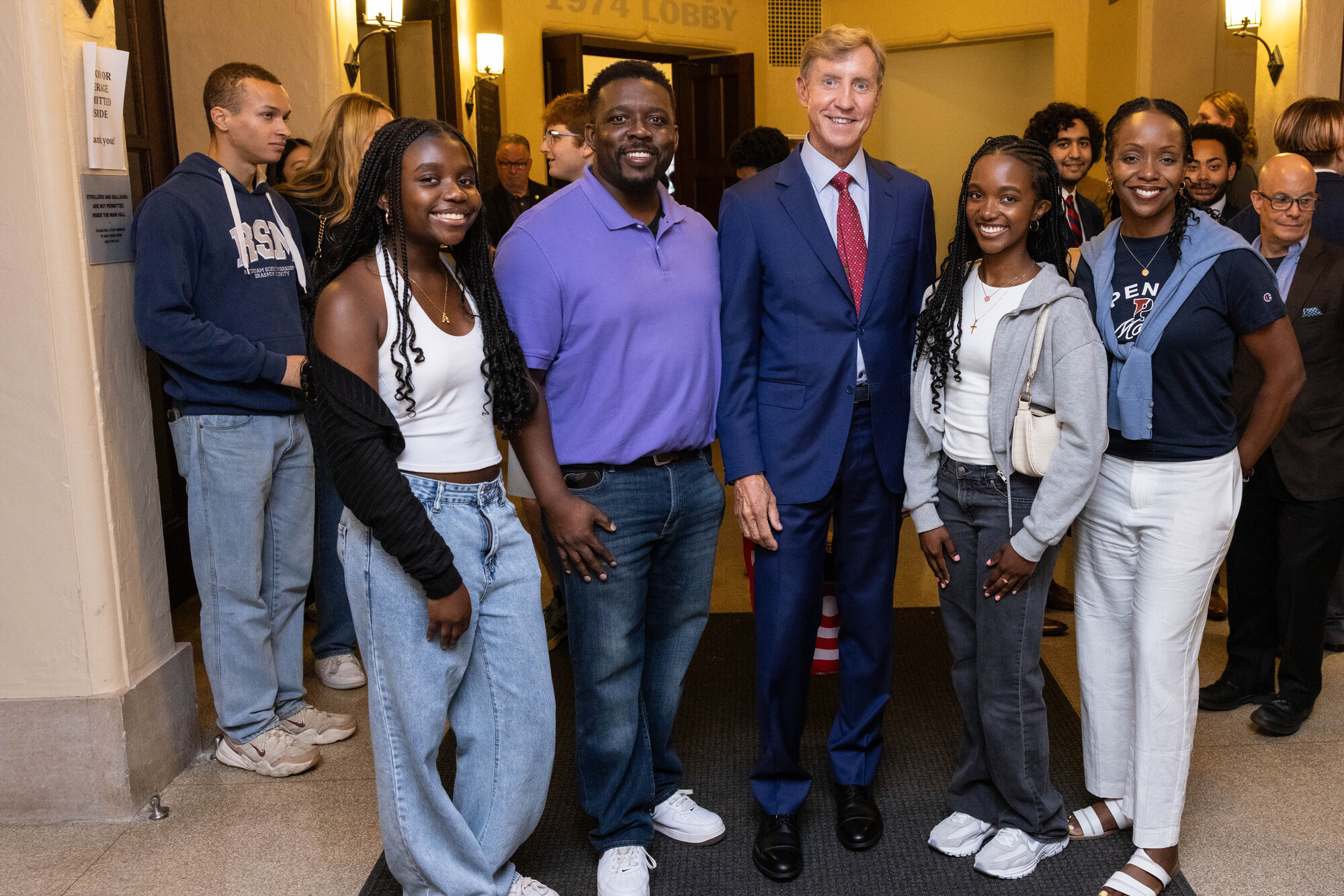 Penn President J. Larry Jameson and a family at the NSO family welcome event.
