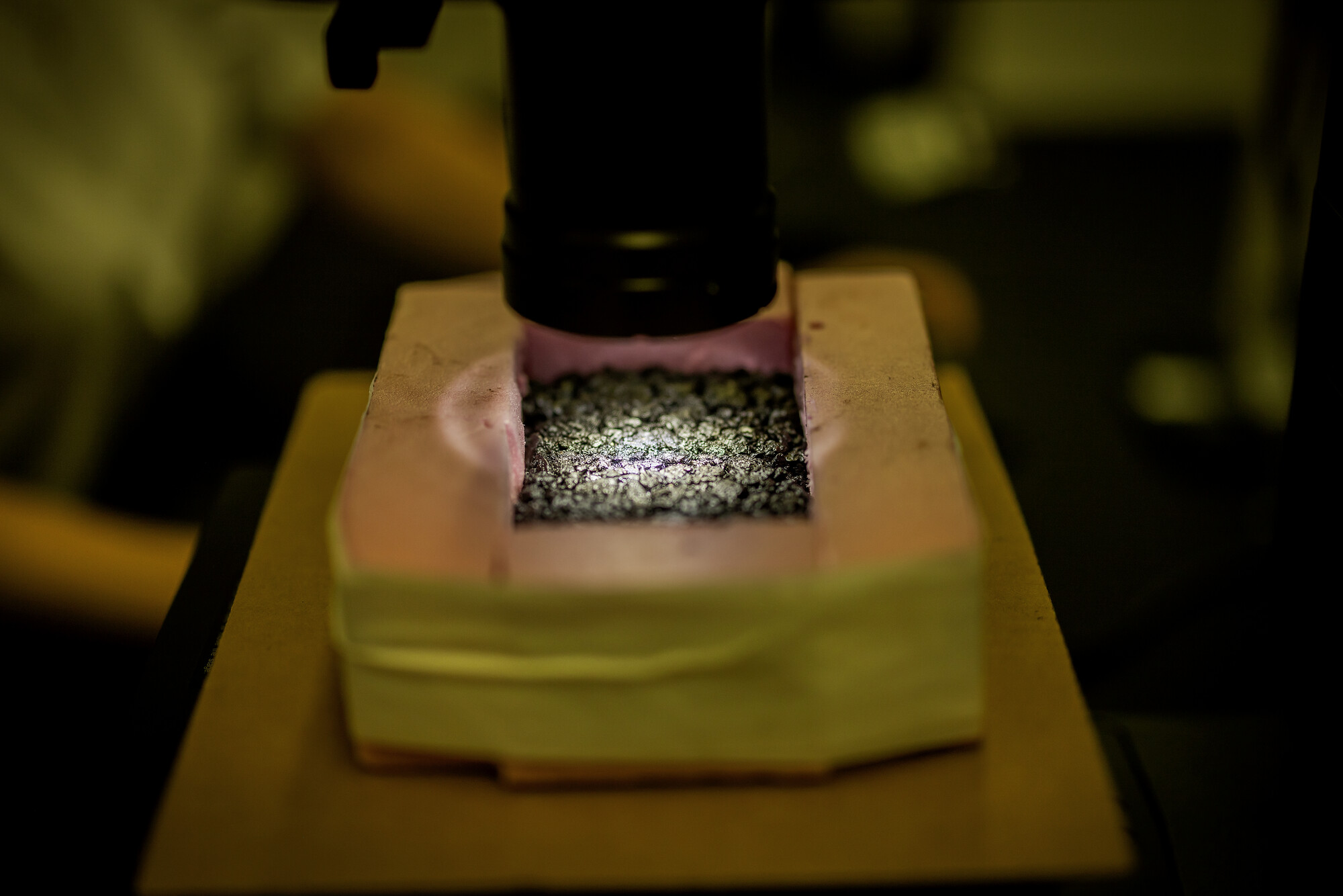 A CoolSeal-treated asphalt brick in the Composto Lab.