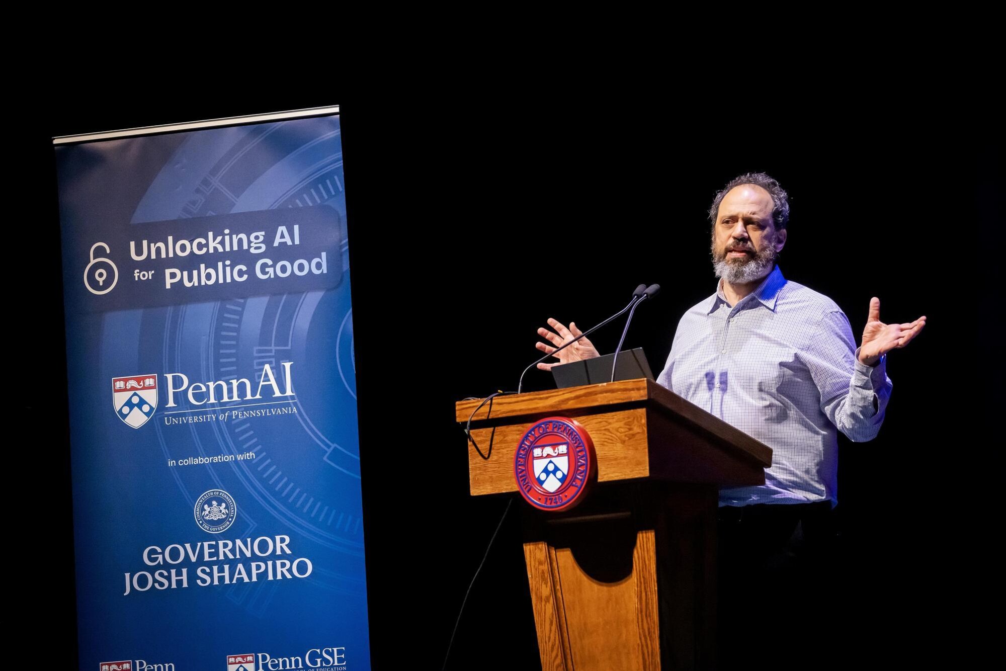 Ethan Mollick speaking at the podium