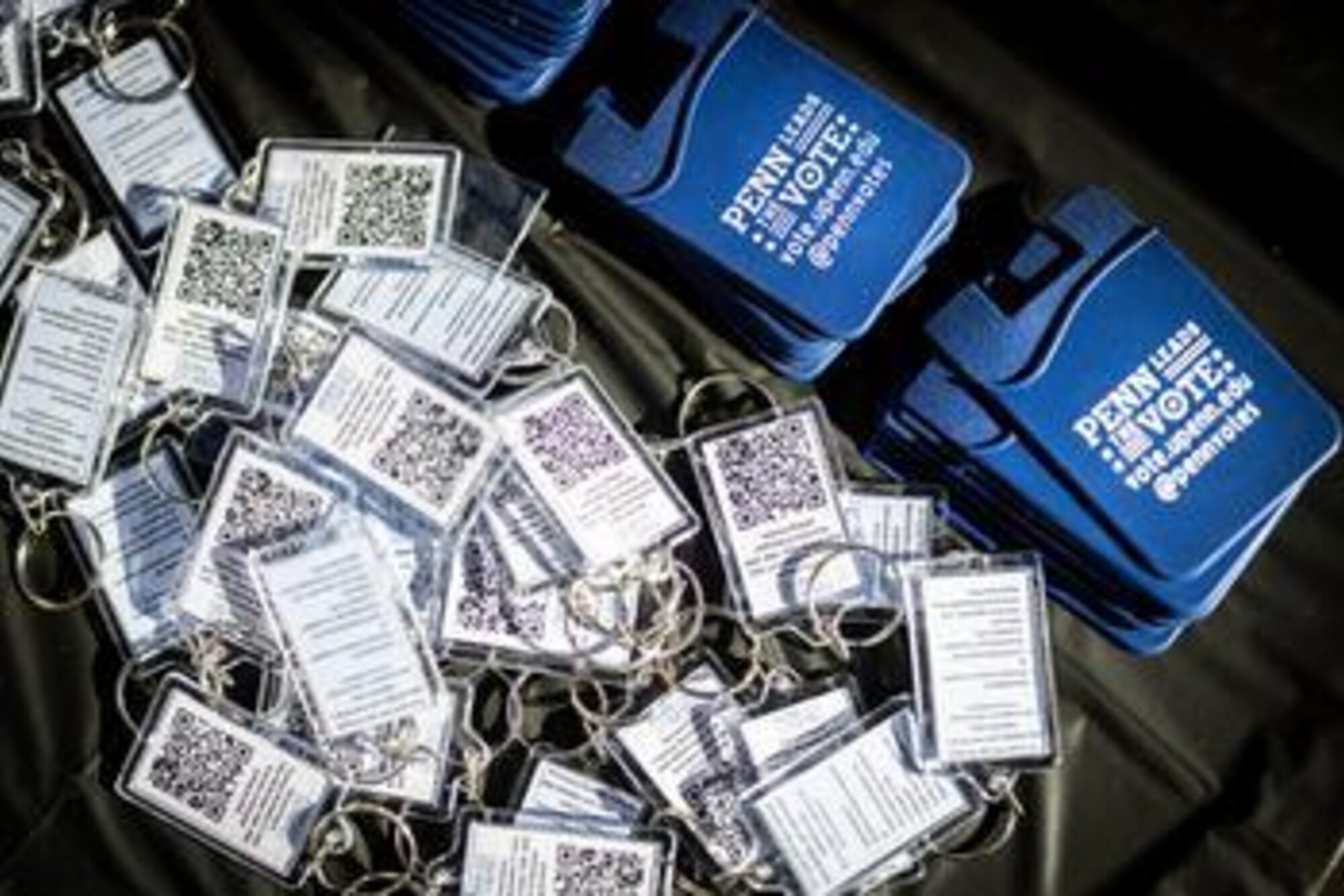 Penn Leads the Vote beer coozies and keychains.