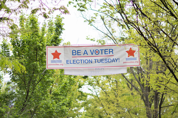 Be a Voter banner hanging on Locust Walk.