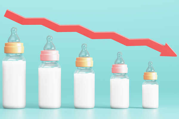 Artist rendering of fertility decline. Depopulation, demographic crisis. Baby bottles in the form of graph and down arrow.
