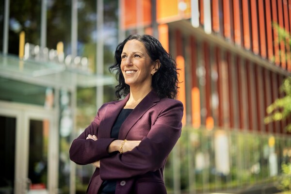 Dean Katharine Strunk looking ahead in front of the GSE building.