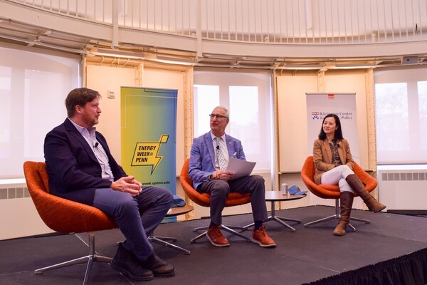 Jonathan Thompson, Andrew M. Hoffman, and Grace Wu on stage.