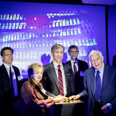 Penn Interim President J. Larry Jameson at the podium with P. Roy and Diana T. Vagelos, Ramanan Raghavendran and Vijay Kumar.n