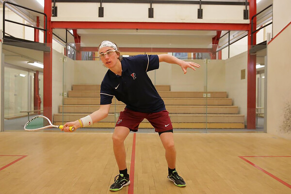 Mens squash player on the court