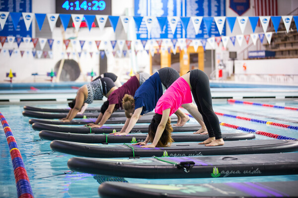 Penn Campus Recreation offered a free floating yoga class as part of its Spring into Wellness Week.