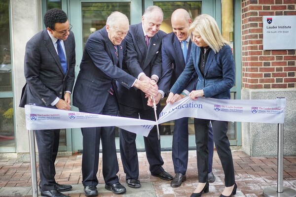 Penn-President-Amy-Gutmann-and-Provost-Wendell-Pritchett-with-Ronald-Lauder-and-Leonard-Lauder-cutting-ribbon-on-Lauder-Institute-building-renovation.