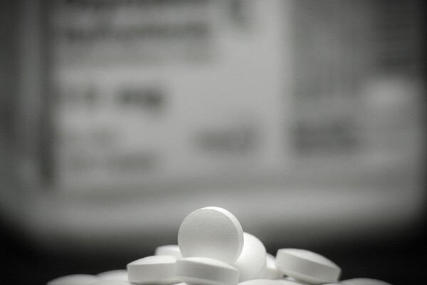 White pills in a pile.