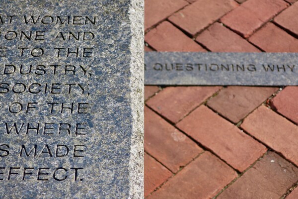 closeup of granite bench and curbing with text