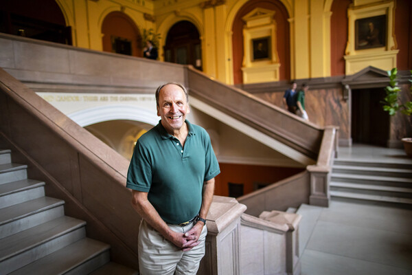 Stephen Burbank on the steps in Silverman Hall at Penn Law School