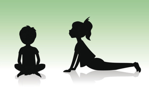 two kids doing yoga poses in silhouette