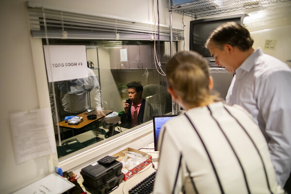 Andrew Strasser in tobacco lab conducting research