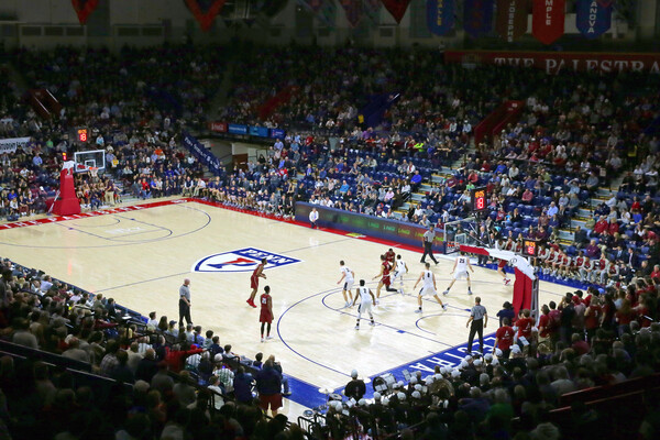 Penn men's basketball players play a game at the Palestra.