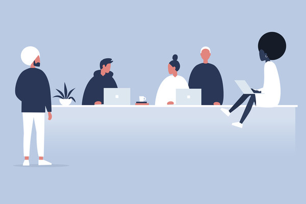 illustration of workers sitting and standing around a long office desk