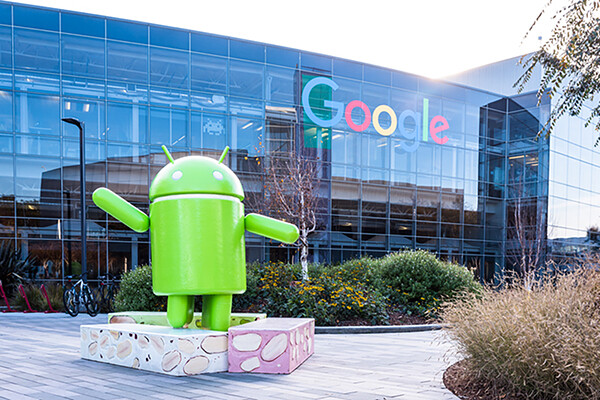 Outside of Google headquarters with large android statue