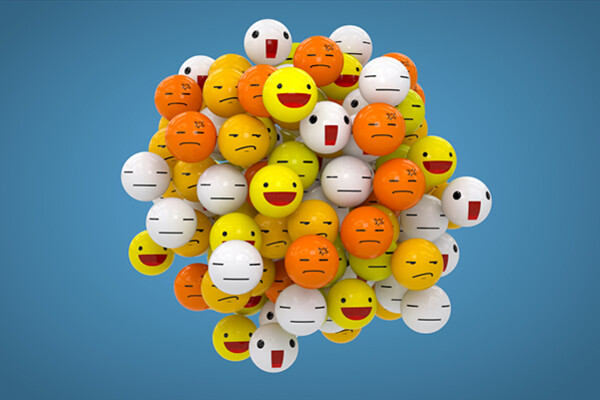 Cluster of multicolored balls drawn with various emoji faces.