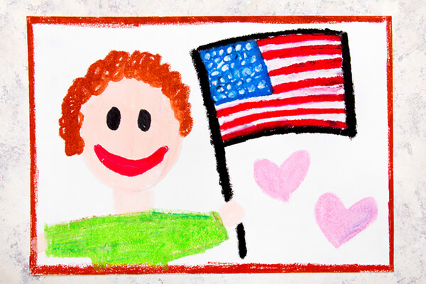 Crayon drawing of person holding an American flag