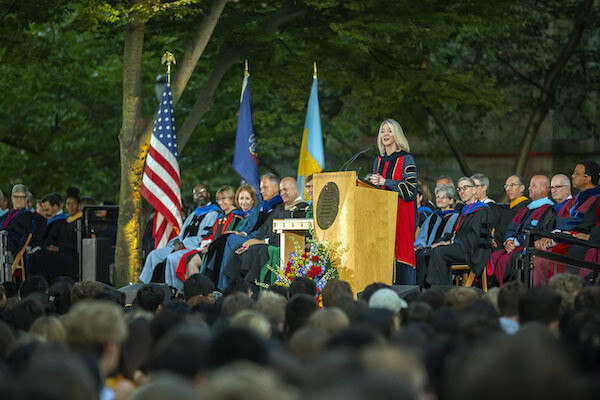 Amy Gutmann at the podium outside College Hall addressing the Class of 2023