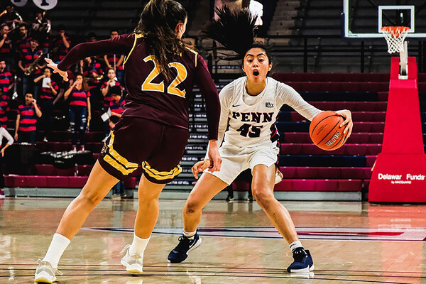 At the Palestra, guard Kayla Padilla prepares to crossover an opponent.