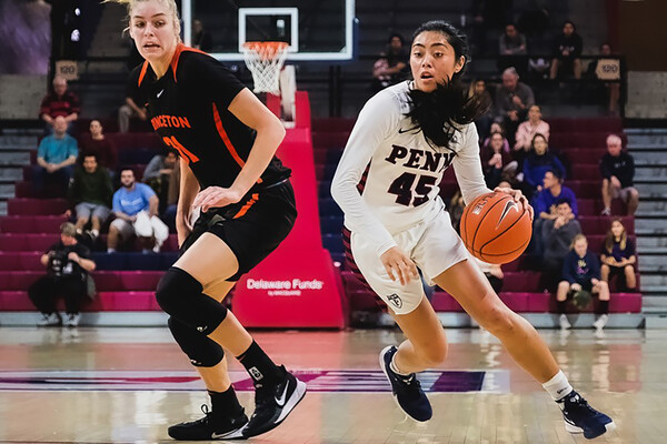At the Palestra against Princeton, freshman guard Kayla Padilla drives to the basket with the ball.
