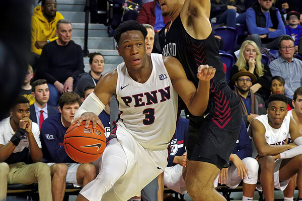 Freshman guard Jordan Dingle drives to the basketball with the ball against Harvard at the Palestra.