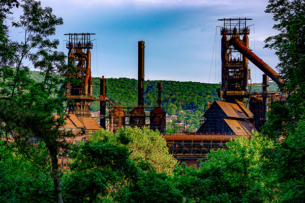 defunct factory with green Lehigh Valley in background
