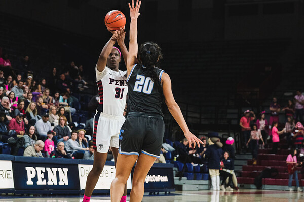 Eleah Parker, a junior center, shoots a jump shot over a defender at the Palestra against Columbia.