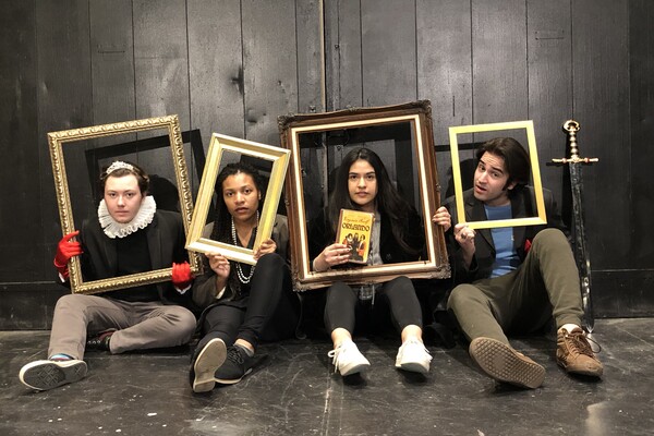 Four students sitting on the floor each with a frame around their faces, one of them holding the book titled Orlando.