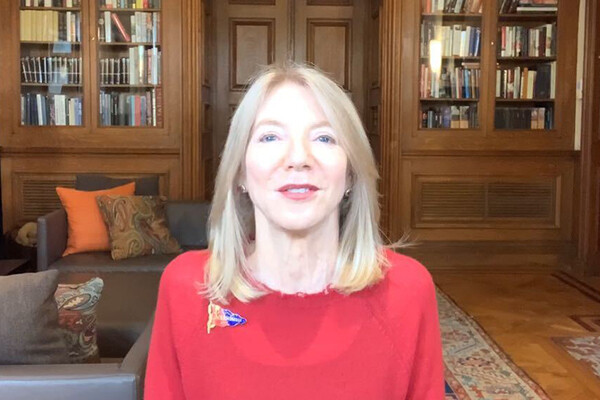 Dr. Gutmann sits at her computer and addresses the screen