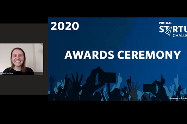 screen shot of a member of My Virtual Vet on the computer screen with a visual of the 2020 Virtual Startup Challenge Awards Ceremony cover photo
