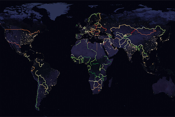 Satellite image of Earth highlighting border in different colors.