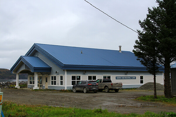 Two vehicles parked outside the Harris Sub-Regional Clinic in Alaska