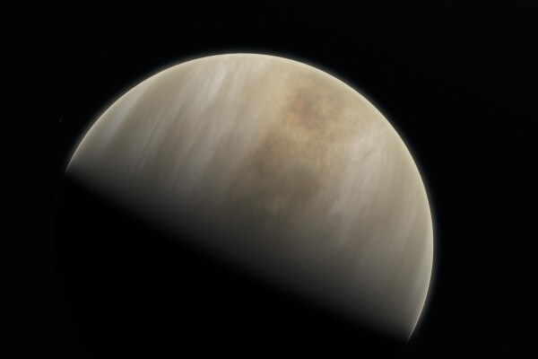 an artists impression of venus, shown half in shadow with a cream and tan colored atmosphere