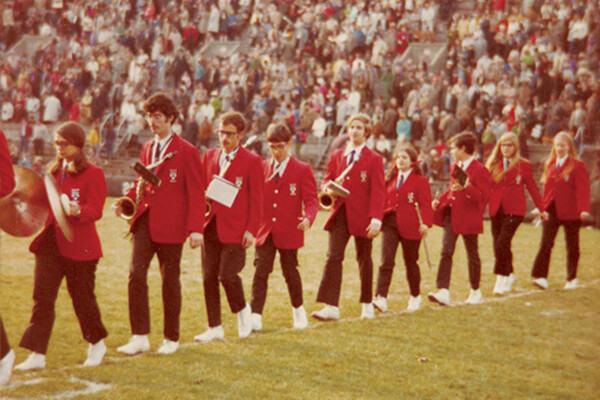 Members of the Penn Band take the field in a row in 1970.