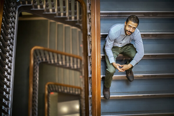 ben baker sitting on the steps looking up